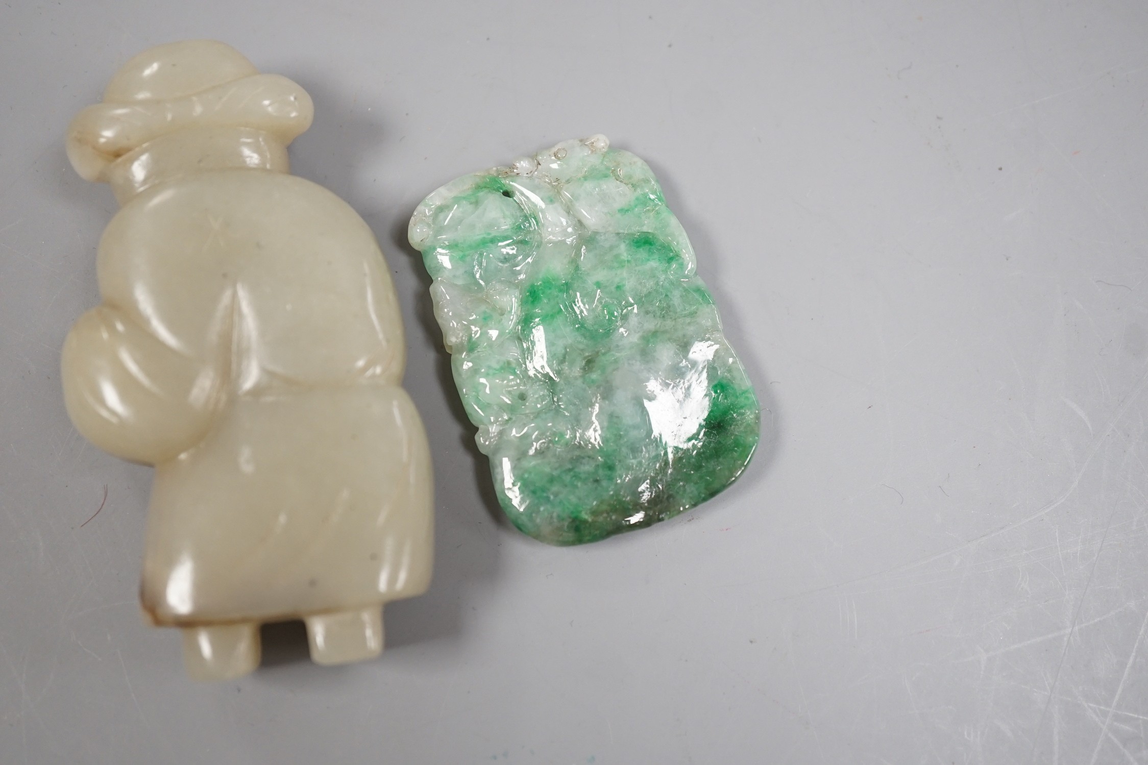 A Chinese celadon jade figure and a jadeite plaque (2)